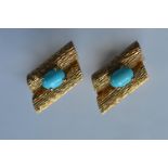 A heavy pair of 18 carat heavy modernistic turquoi