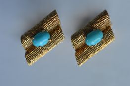 A heavy pair of 18 carat heavy modernistic turquoi