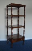 Four tier mahogany whatnot with single drawer and