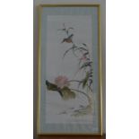 An Oriental tapestry of a bird on a reed in a lily