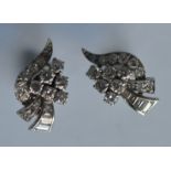 An attractive pair of platinum cocktail earrings i