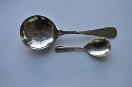 A Russian Continental spoon together with a caddy