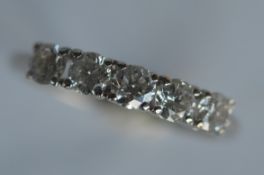 A good diamond five stone ring in platinum claw mount. Est. £600 - £700.