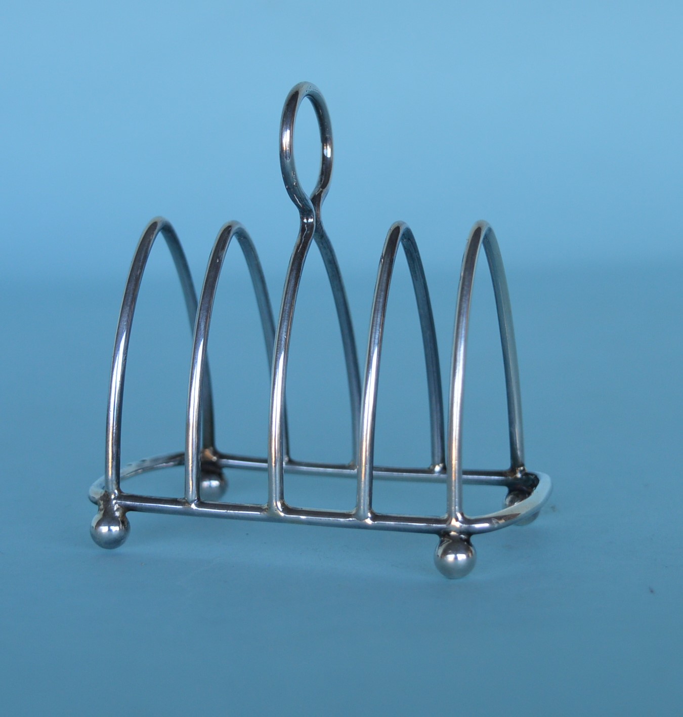 A small arched bar toast rack. Chester by JJ&F. Ap