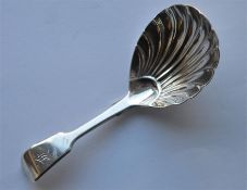 A fiddle pattern caddy spoon with reeded bowl. Lon
