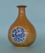 An 18th Century blue ground bottle with three flor