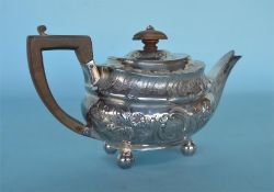 A small baluster shaped teapot with chase decorati