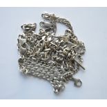 A quantity of silver necklaces and bracelets. Appr