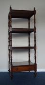 Mahogany four tier whatnot on turned support. Est.