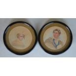 A pair of early 19th Century watercolours in ebony