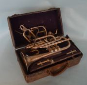 An old trumpet in leather case. Est. £30 - £50.