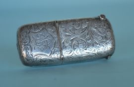 An unusual engraved vesta case / sovereign holder