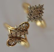 Two gold and diamond set cluster rings. Approx. 4.