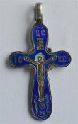 A small Russian cross with enamel decoration and l