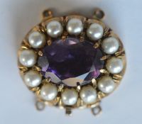 A heavy amethyst and pearl 9ct. clasp. Approx. 8.9