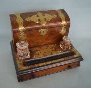 A good walnut and brass mounted ink well with hing