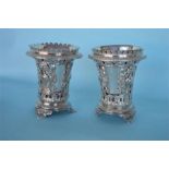 A good pair of Continental bottle vases pierced wi