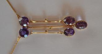 An Antique amethyst drop pendant mounted with five
