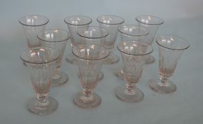 An attractive set of ten custard cups on tapering