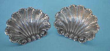 A pair of heavy Continental shell decorated salts