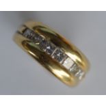 A good diamond nine stone princess cut ring in 18c