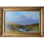 G SHAW: A lady on river's edge with moorland landscape, in gilt frame. Approx. 35 cms x 59 cms. Est.