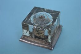 An unusual square string holder with glass body. L