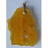 A Chinese yellow jade pendant with loop top. Est.