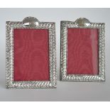 A pair of good quality embossed picture frames wit