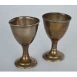 A pair of Georgian Irish egg cups on reeded suppor