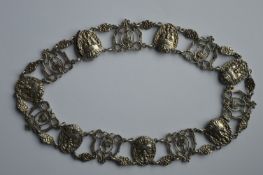 A Continental unusual necklace mounted with figure
