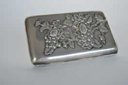 A good Chinese cigar case with textured flower and