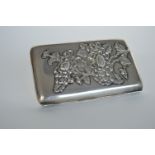 A good Chinese cigar case with textured flower and