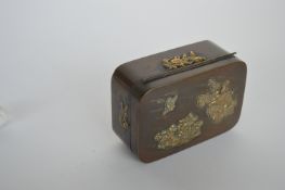 A rectangular brass Shakudo box decorated with bir