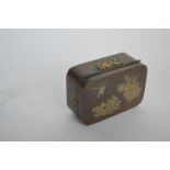 A rectangular brass Shakudo box decorated with bir