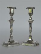 A good pair of neoclassical candlesticks with shap