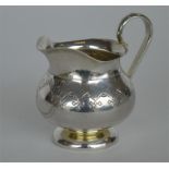 A good quality Russian engraved cream jug marked t