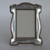 A stylish picture frame with reeded border and oak
