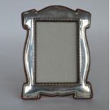 A stylish picture frame with reeded border and oak
