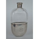 A glass mounted hip flask with screw on cover. Lon