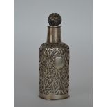 A Chinese leaf decorated bottle with tapered stopp