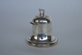 A large vintage bell shaped inkwell with hinged to