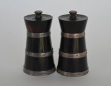 A pair of good silver and hardwood pepper grinders