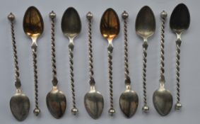 A set of ten Continental spoons with twisted stems and ball finial. Approx. 118 grams. Est. £40 - £