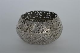 A heavy Indian bowl with floral decoration. Approx
