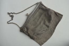 A silver mesh purse on suspension chain with leather mounted interior. London. By RC. Approx. 280
