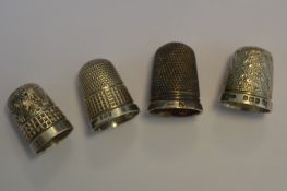 A bag containing four thimbles. Est. £20 - £30.