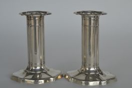 A good pair of candlesticks with wavy edges and re
