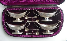 A good cased set of four Adams' style salts with half fluted body. London. By TB&JH. Approx. 360