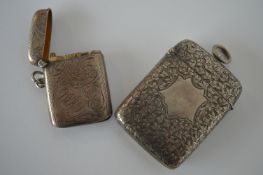 A good large engraved vesta case, together with one other. Birmingham. By M&L. Est. £50 - £60.